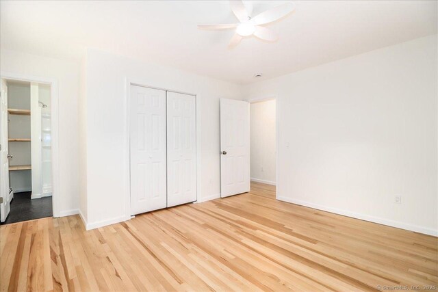 36 Jotham Rd, New Milford, CT 06776 - unfurnished bedroom featuring light wood finished floors, a closet, and ceiling fan