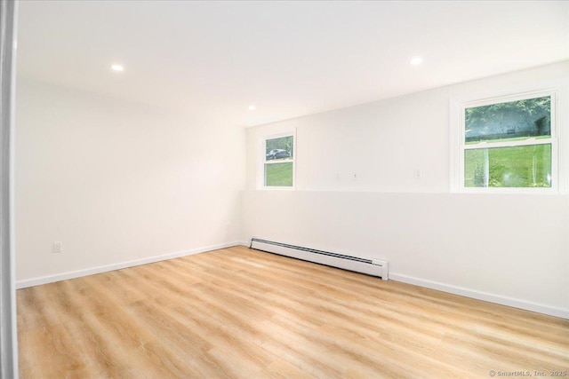 36 Jotham Rd, New Milford, CT 06776 - empty room with a baseboard radiator, light wood-type flooring, and recessed lighting
