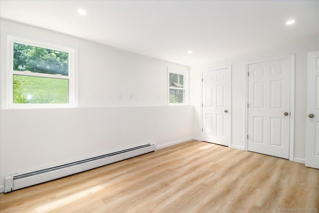 36 Jotham Rd, New Milford, CT 06776 - unfurnished bedroom with a baseboard radiator, wood finished floors, and recessed lighting