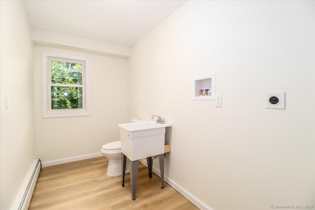 36 Jotham Rd, New Milford, CT 06776 - laundry room with a baseboard heating unit, washer hookup, and light wood finished floors