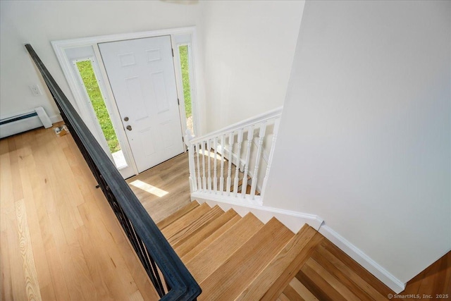36 Jotham Rd, New Milford, CT 06776 - entryway featuring wood finished floors and a baseboard radiator
