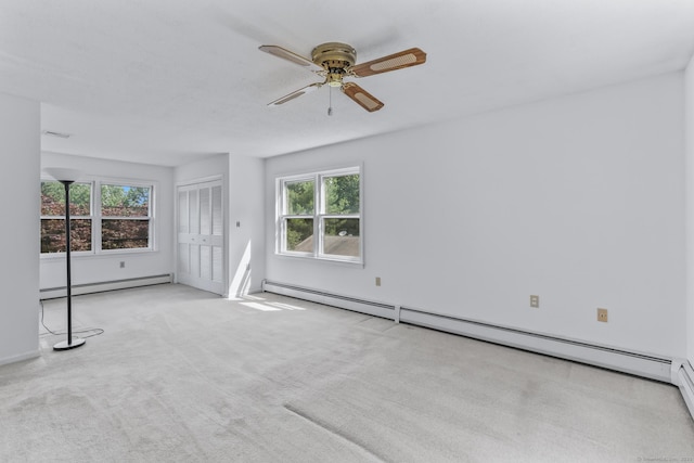 55 Grickis Ln, Naugatuck, CT 06770 - empty room featuring a baseboard heating unit, healthy amount of natural light, and ceiling fan