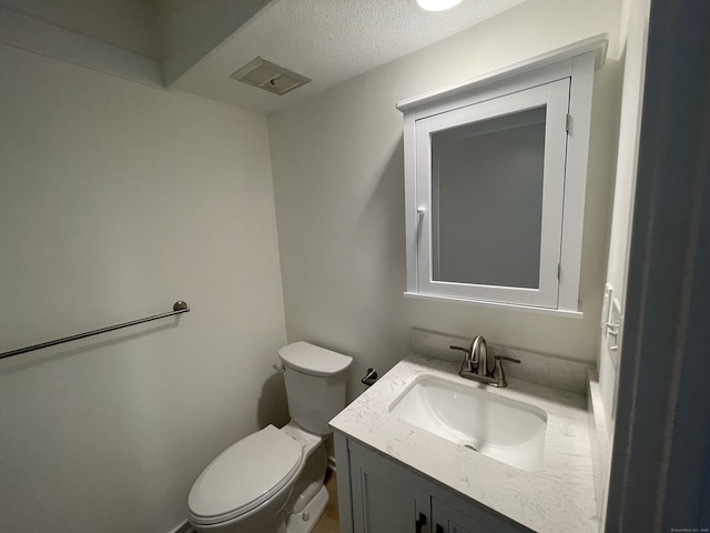 277 Heritage Vlg Unit C, Southbury, CT 06488 - bathroom featuring vanity and a textured ceiling