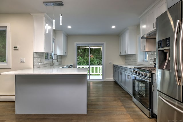 13 School St, Monroe, CT 06468 - kitchen featuring stainless steel appliances, light countertops, decorative backsplash, dark wood-style flooring, and recessed lighting