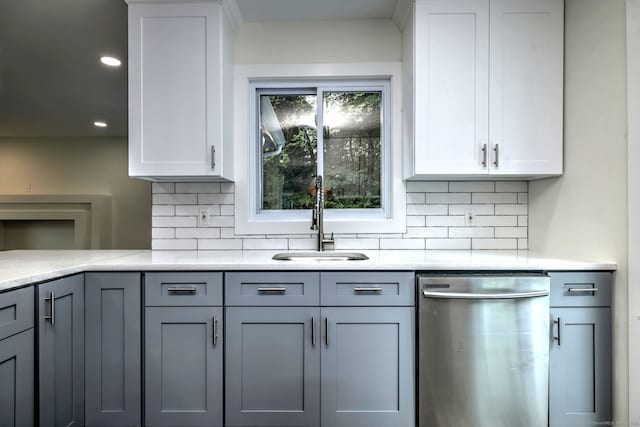 13 School St, Monroe, CT 06468 - kitchen with stainless steel dishwasher, decorative backsplash, light countertops, and recessed lighting