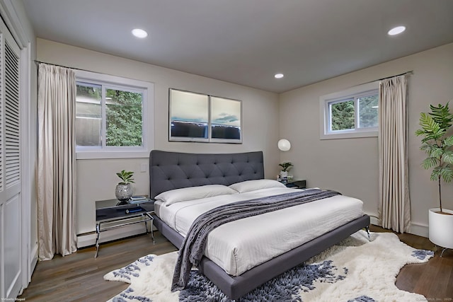 13 School St, Monroe, CT 06468 - bedroom with baseboard heating, wood finished floors, and recessed lighting