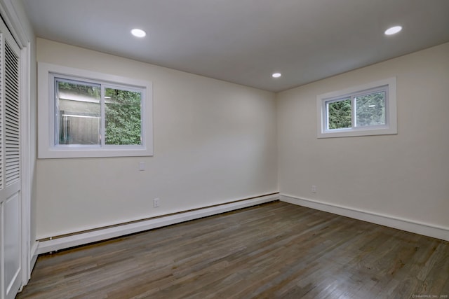 13 School St, Monroe, CT 06468 - empty room with a baseboard radiator, healthy amount of natural light, wood finished floors, and recessed lighting