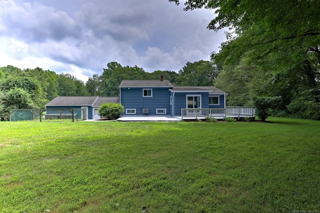 13 School St, Monroe, CT 06468 - back of house with a deck, a yard, a chimney, and a wooded view
