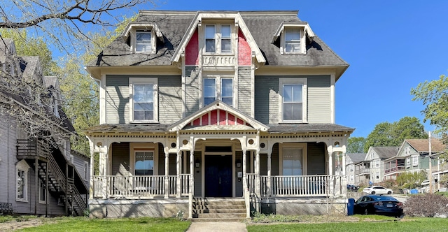 214 Broadway, Norwich, CT 06360 - view of front of home with covered porch and roof with shingles