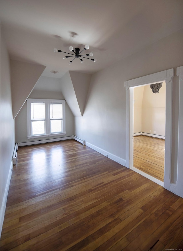 214 Broadway, Norwich, CT 06360 - bonus room with dark wood-style floors, lofted ceiling, and baseboard heating