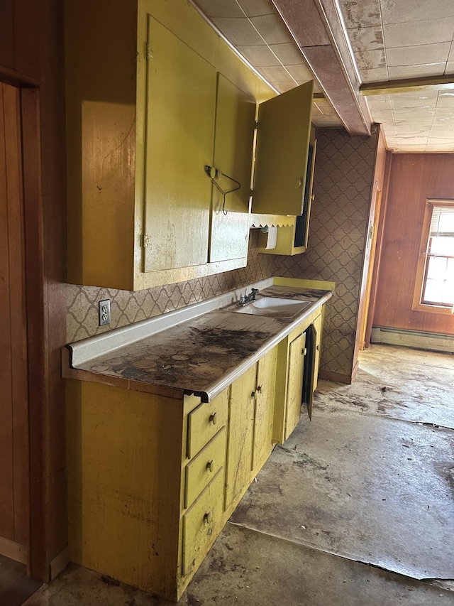 36 Boswell Ave, Norwich, CT 06360 - kitchen featuring a baseboard heating unit and tasteful backsplash
