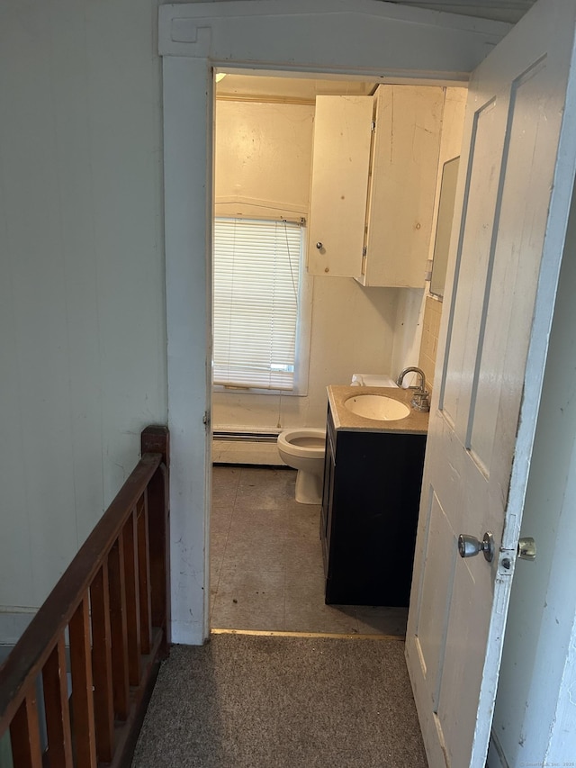 36 Boswell Ave, Norwich, CT 06360 - bathroom featuring a baseboard heating unit and vanity