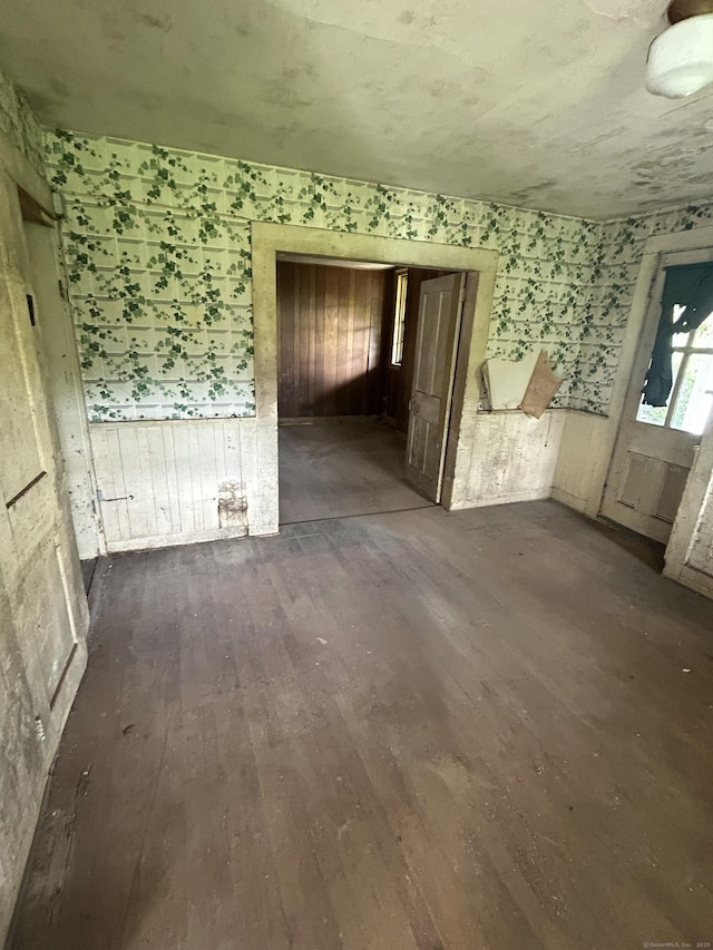 36 Boswell Ave, Norwich, CT 06360 - spare room featuring hardwood / wood-style floors and wallpapered walls