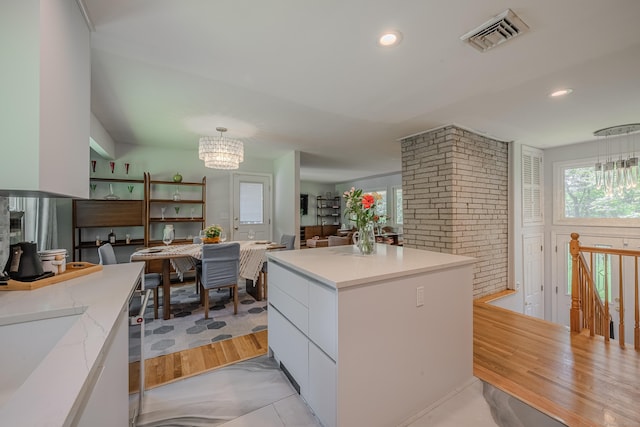 4 Northrop Rd, Woodbridge, CT 06525 - kitchen with a chandelier, white cabinetry, healthy amount of natural light, decorative light fixtures, and recessed lighting