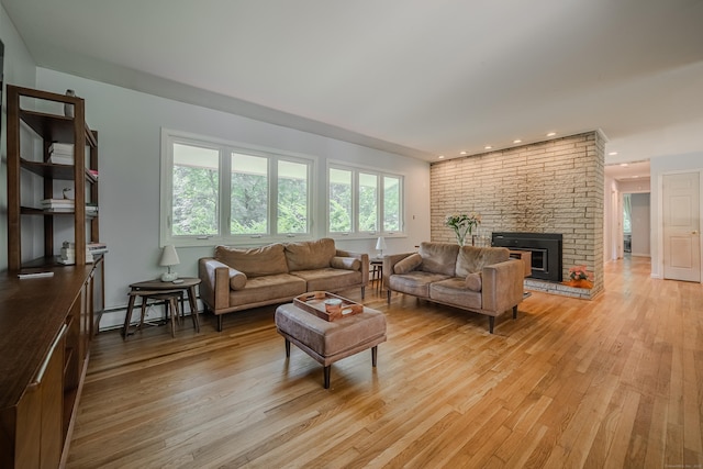 4 Northrop Rd, Woodbridge, CT 06525 - living room featuring light wood finished floors, a brick fireplace, baseboard heating, and recessed lighting