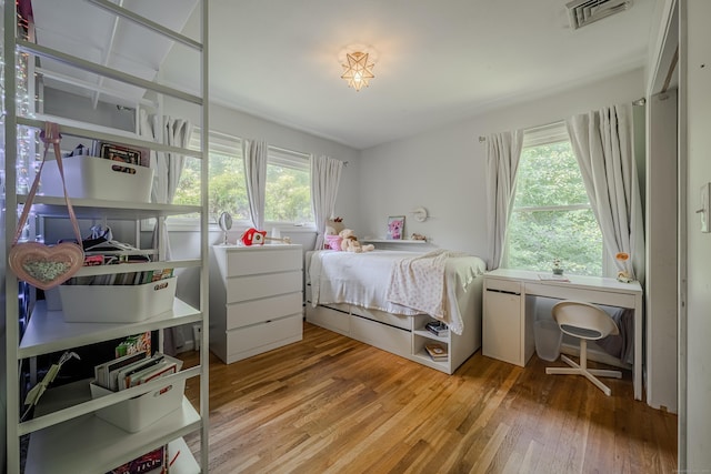 4 Northrop Rd, Woodbridge, CT 06525 - bedroom with light wood-type flooring and multiple windows