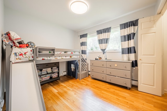4 Northrop Rd, Woodbridge, CT 06525 - bedroom featuring light wood finished floors and a baseboard radiator