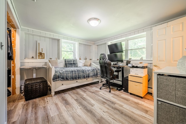 4 Northrop Rd, Woodbridge, CT 06525 - bedroom featuring light wood-type flooring and a baseboard heating unit