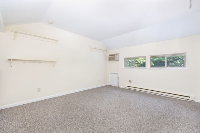 430 Emmett St Apt L, Bristol, CT 06010 - spare room featuring baseboard heating, lofted ceiling, an AC wall unit, carpet flooring, and a smoke detector
