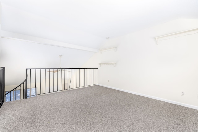 430 Emmett St Apt L, Bristol, CT 06010 - carpeted spare room featuring vaulted ceiling and baseboards