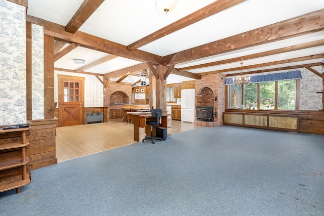 934 Jerome Ave, Bristol, CT 06010 - living area with a fireplace, radiator, beam ceiling, a chandelier, and light colored carpet
