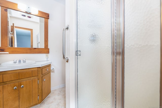934 Jerome Ave, Bristol, CT 06010 - bathroom featuring vanity, a shower stall, and tile patterned floors