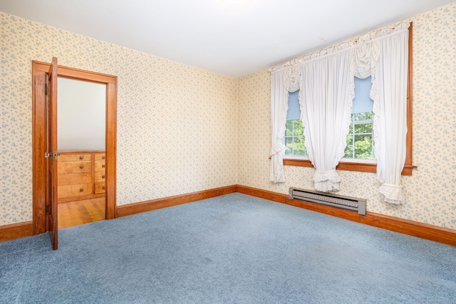 934 Jerome Ave, Bristol, CT 06010 - carpeted spare room with baseboard heating and wallpapered walls