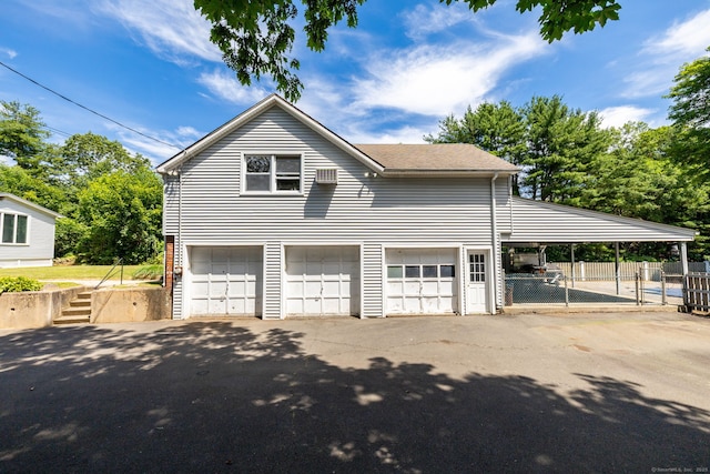 934 Jerome Ave, Bristol, CT 06010 - view of front facade featuring driveway and a garage