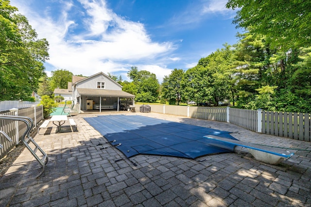 934 Jerome Ave, Bristol, CT 06010 - view of pool with a patio area, a fenced backyard, and a diving board