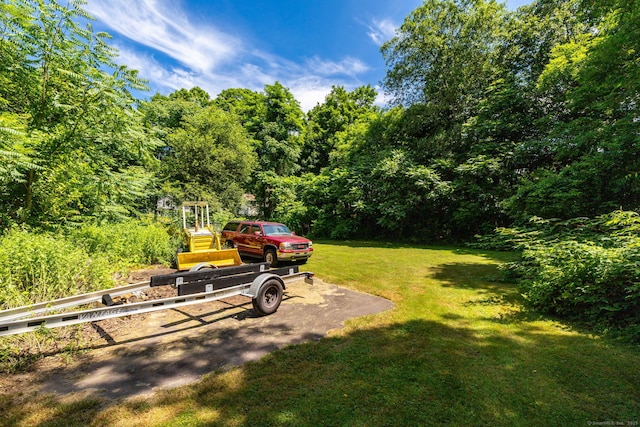 934 Jerome Ave, Bristol, CT 06010 - view of grassy yard featuring a forest view