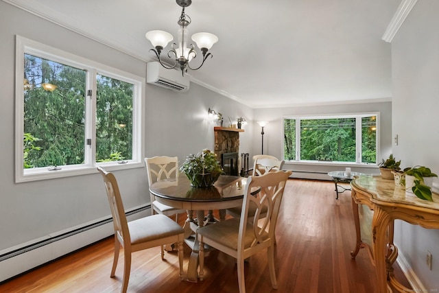 70 Bayne St, Norwalk, CT 06851 - dining space featuring a wall mounted air conditioner, a baseboard radiator, ornamental molding, plenty of natural light, and a chandelier