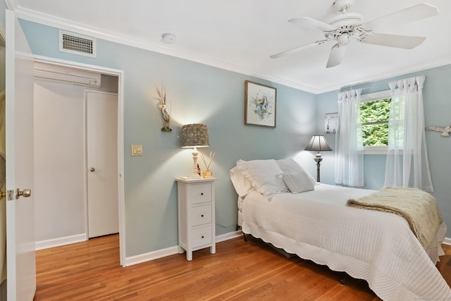 70 Bayne St, Norwalk, CT 06851 - bedroom with wood finished floors, crown molding, and a ceiling fan