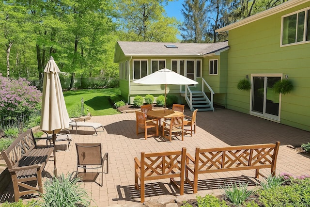 70 Bayne St, Norwalk, CT 06851 - view of patio featuring outdoor dining area and a wooden deck