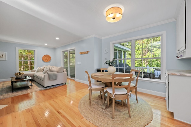 30 Poppy Ln, East Lyme, CT 06333 - dining room featuring healthy amount of natural light, light wood-style floors, ornamental molding, and recessed lighting