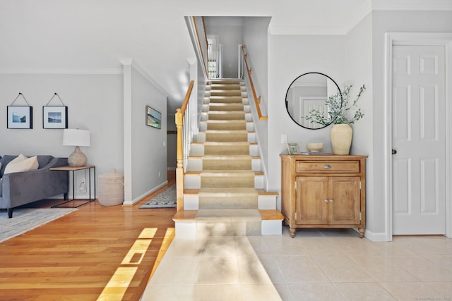 30 Poppy Ln, East Lyme, CT 06333 - stairs with ornamental molding and wood finished floors