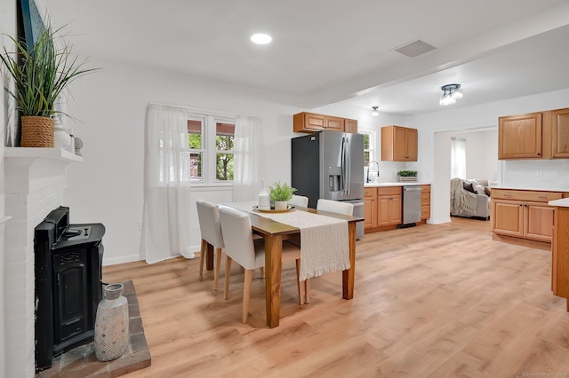112 Lake Rd, Andover, CT 06232 - dining room featuring light wood finished floors and recessed lighting