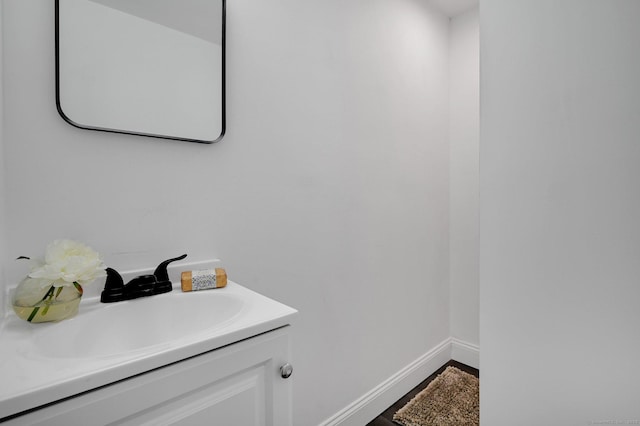 112 Lake Rd, Andover, CT 06232 - bathroom with vanity and wood finished floors