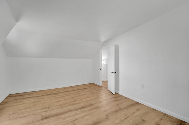 112 Lake Rd, Andover, CT 06232 - bonus room with lofted ceiling and light wood finished floors