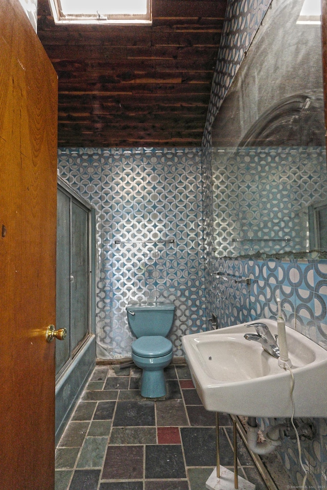 25 Summer Pl, Milford, CT 06460 - full bathroom with stone tile floors and wallpapered walls