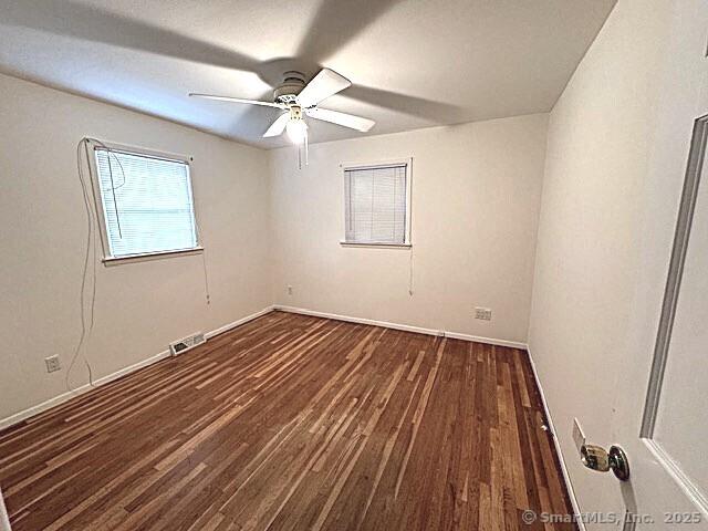 21 Eastwood Rd, Bridgeport, CT 06606 - spare room featuring wood finished floors and a ceiling fan