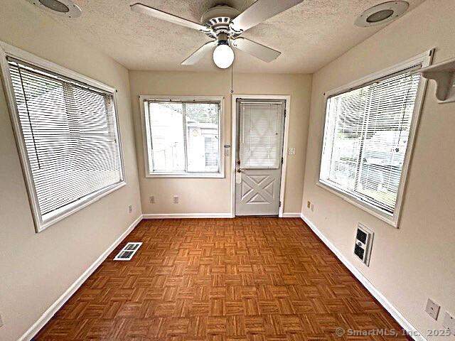 21 Eastwood Rd, Bridgeport, CT 06606 - unfurnished sunroom featuring healthy amount of natural light