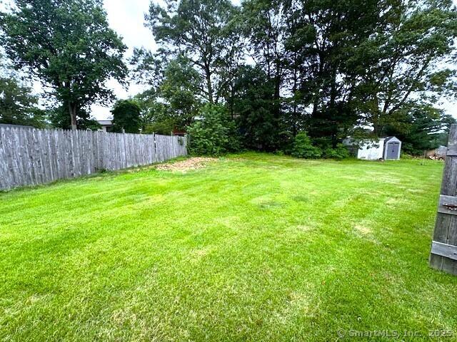 21 Eastwood Rd, Bridgeport, CT 06606 - view of yard featuring a storage unit