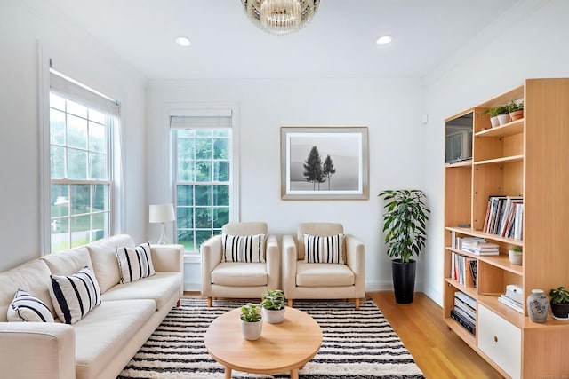 50 Buckingham Rd, Avon, CT 06001 - living room with light wood-style flooring, crown molding, recessed lighting, and a chandelier
