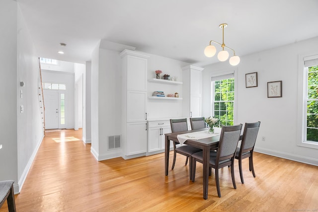 50 Buckingham Rd, Avon, CT 06001 - dining room featuring light wood finished floors and plenty of natural light