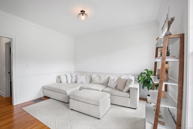 50 Buckingham Rd, Avon, CT 06001 - living area featuring crown molding and wood finished floors