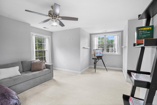 50 Buckingham Rd, Avon, CT 06001 - living area featuring a ceiling fan, light colored carpet, and plenty of natural light