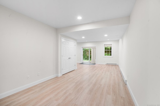 50 Buckingham Rd, Avon, CT 06001 - empty room with light wood finished floors, baseboard heating, a baseboard heating unit, and recessed lighting