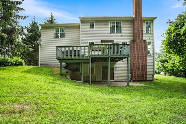 50 Buckingham Rd, Avon, CT 06001 - rear view of house featuring a chimney, a wooden deck, a lawn, and a patio
