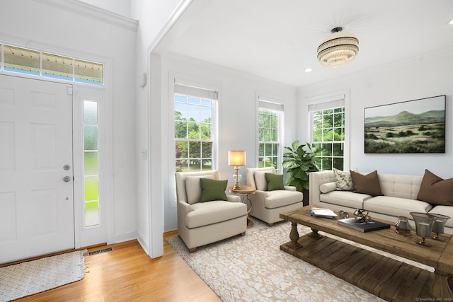 50 Buckingham Rd, Avon, CT 06001 - living room with light wood finished floors, ornamental molding, and recessed lighting