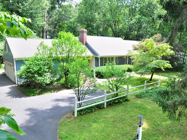 3 Carriage Dr, Canton, CT 06019 - ranch-style home featuring driveway, a chimney, a shingled roof, and an attached garage